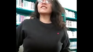 Desi Nymph flashing boobs in library in front of camera